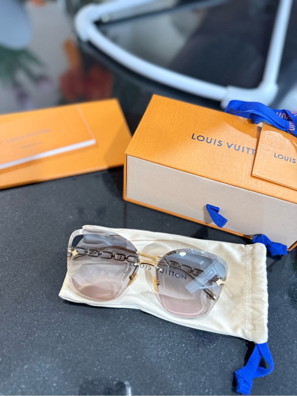 Louis Vuitton Clear Frame Sunglasses with Pink Gradient Lenses